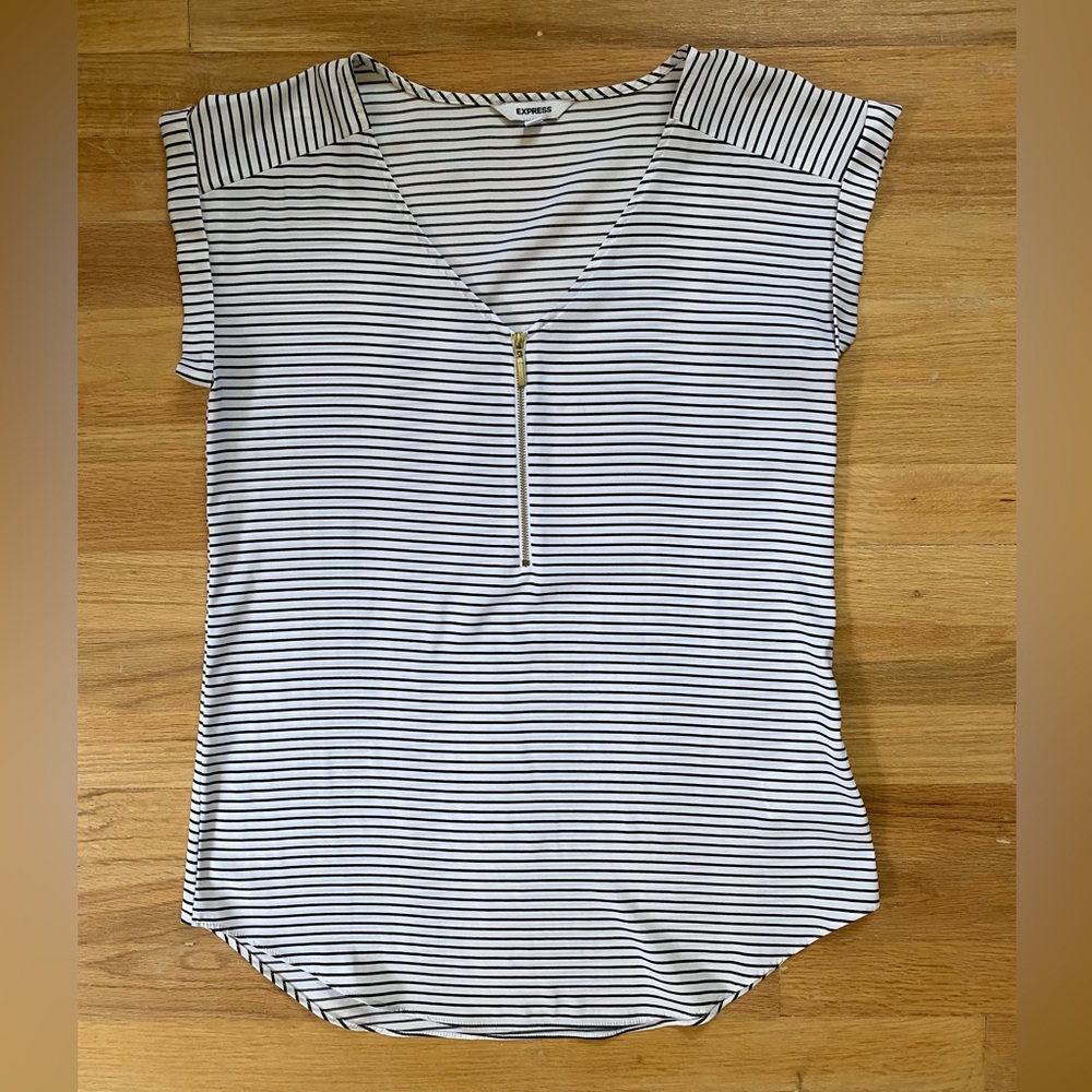 Express women’s black & white striped short-sleeved blouse.